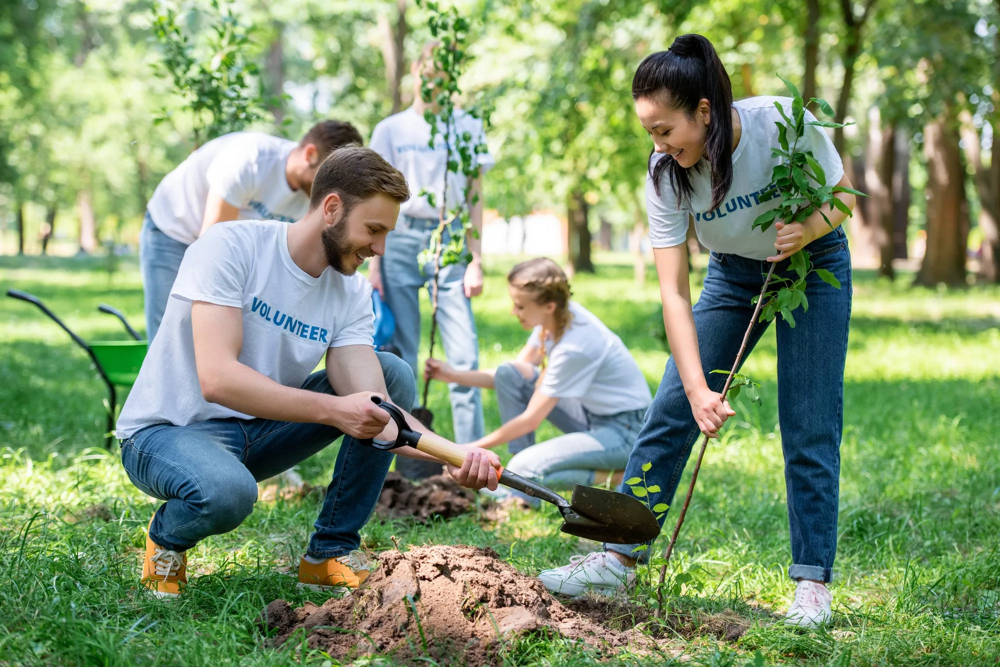 Volunteers working together outdoors